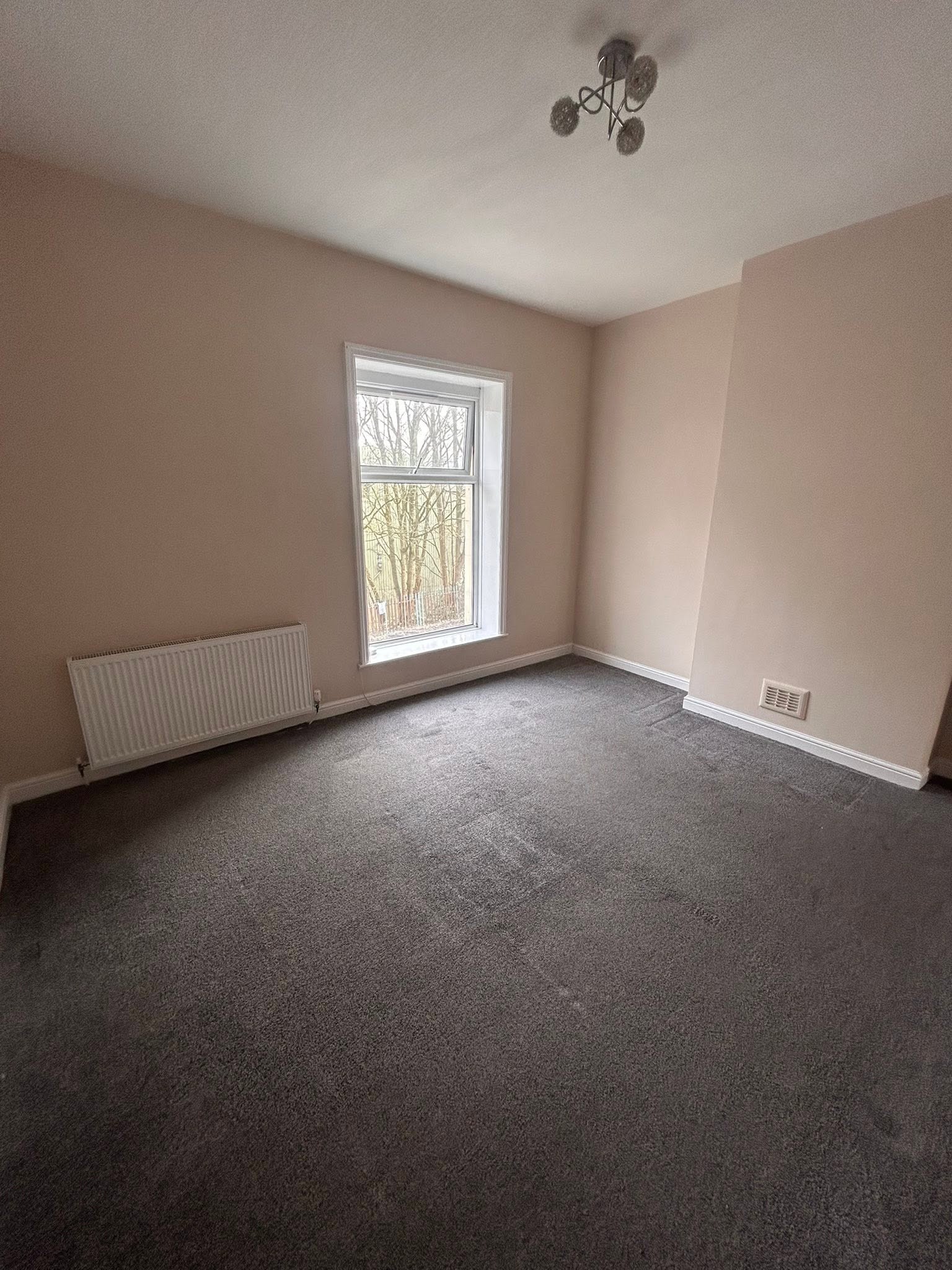 Clean wall painting in residential bedroom project